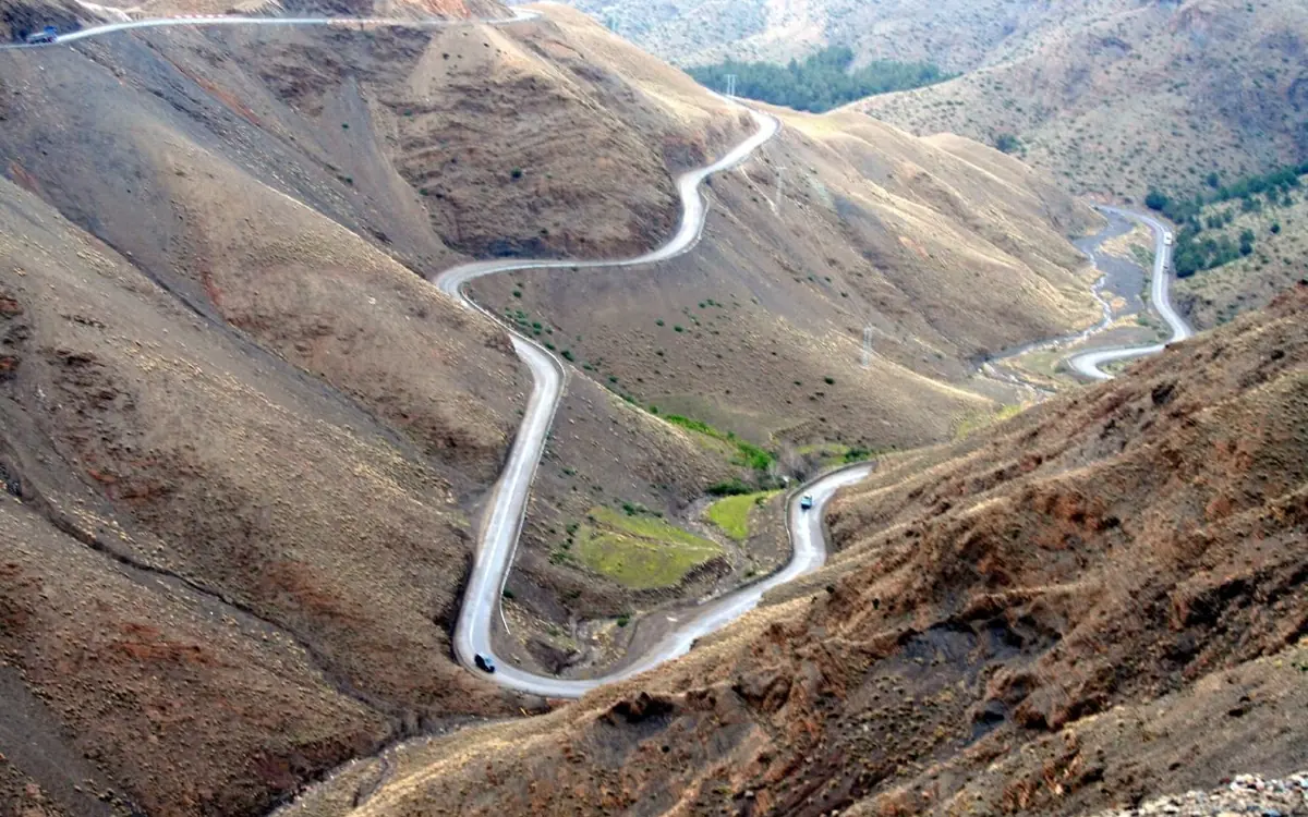 Mountain road climbing over the Atlas on a four-day desert tour from Marrakech